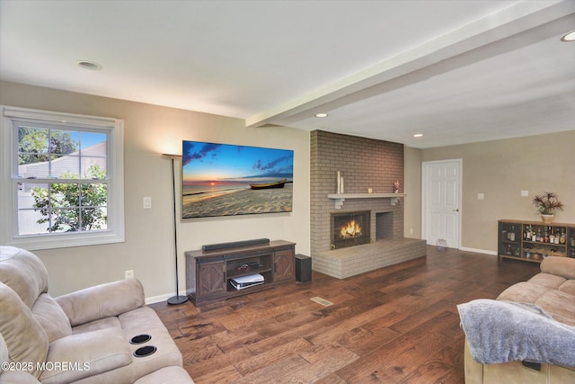 25 Forman Ln, Manalapan, NJ 07726 - living room with wood finished floors, a brick fireplace, and recessed lighting