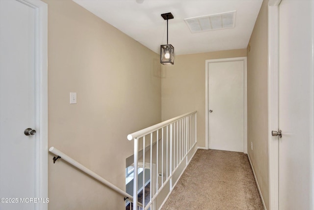 25 Forman Ln, Manalapan, NJ 07726 - hallway with an upstairs landing and carpet floors