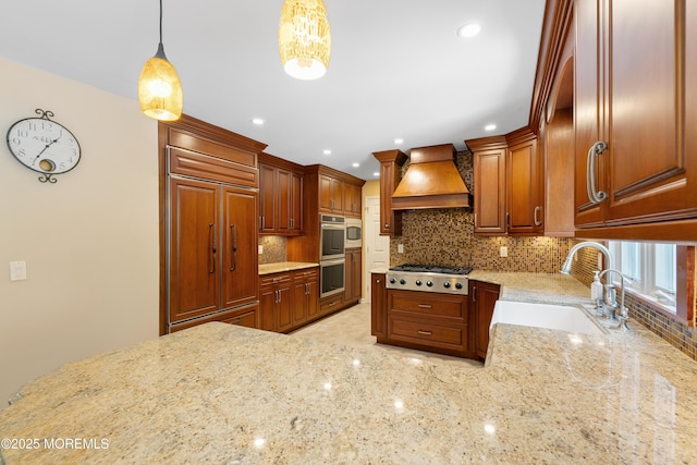 7 Lorraine Ct, East Brunswick, NJ 08816 - kitchen featuring custom exhaust hood, stainless steel appliances, light stone countertops, decorative backsplash, and decorative light fixtures