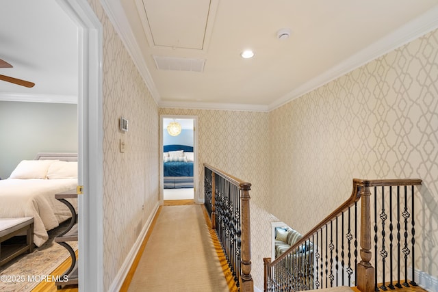 7 Lorraine Ct, East Brunswick, NJ 08816 - hallway featuring attic access, wallpapered walls, ornamental molding, and an upstairs landing