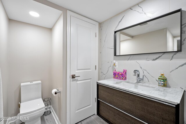 7 Lorraine Ct, East Brunswick, NJ 08816 - bathroom with vanity and wood finished floors