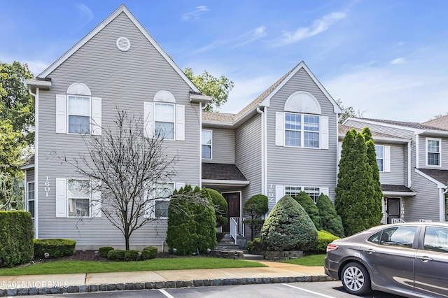 1602 Wagon Wheel Ct, Freehold, NJ 07728 - view of property featuring uncovered parking