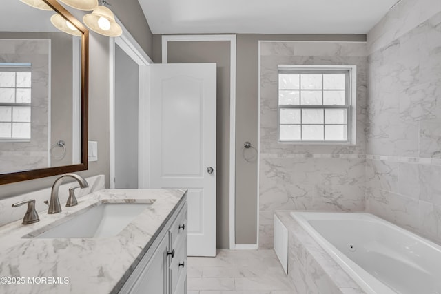 1602 Wagon Wheel Ct, Freehold, NJ 07728 - bathroom featuring vanity, tiled tub, and marble finish flooring