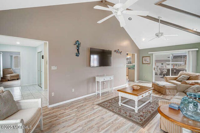 12 Peggy Ln, Beach Haven West, NJ 08050 - living area featuring ceiling fan, high vaulted ceiling, beam ceiling, and light wood-style flooring