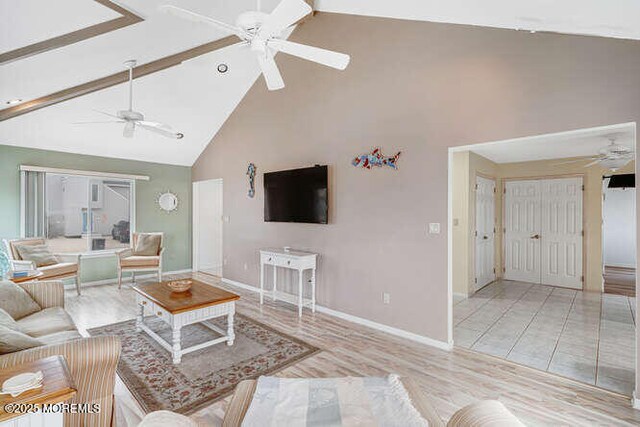 12 Peggy Ln, Beach Haven West, NJ 08050 - living area featuring a ceiling fan and high vaulted ceiling