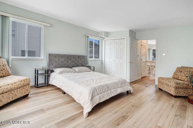 12 Peggy Ln, Beach Haven West, NJ 08050 - bedroom with light wood-style flooring and a closet