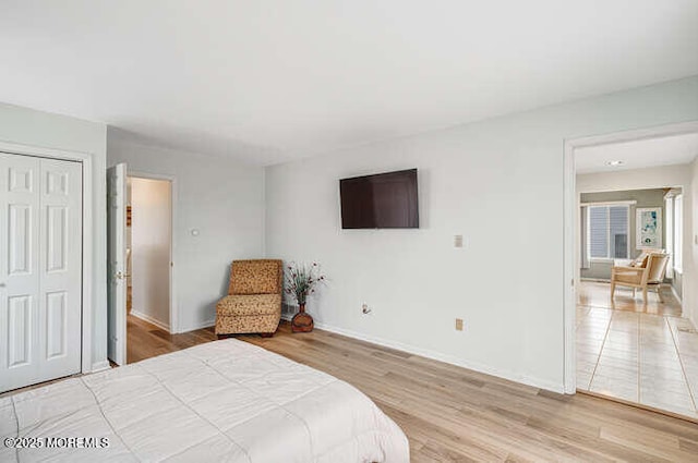 12 Peggy Ln, Beach Haven West, NJ 08050 - bedroom with light wood finished floors and a closet