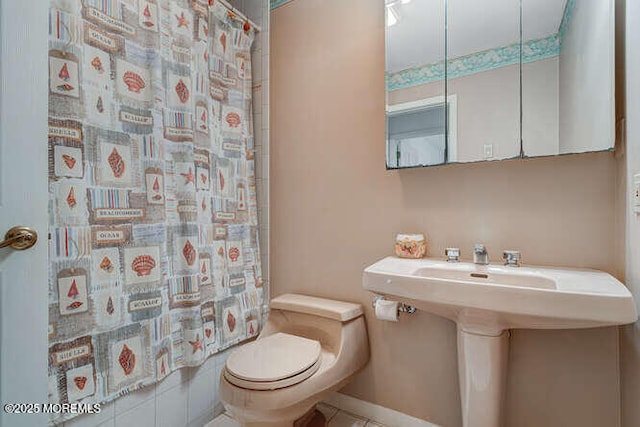 12 Peggy Ln, Beach Haven West, NJ 08050 - bathroom featuring a shower with shower curtain and tile patterned flooring