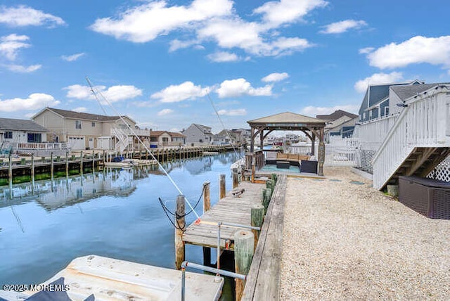 12 Peggy Ln, Beach Haven West, NJ 08050 - dock area featuring a water view, a residential view, an outdoor hangout area, a gazebo, and stairway