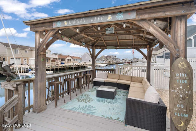 12 Peggy Ln, Beach Haven West, NJ 08050 - wooden terrace featuring a gazebo, a water view, and an outdoor hangout area