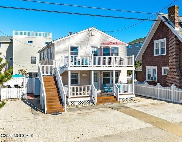 25 E 49th St, Long Beach Twp, NJ 08008 - view of front of home featuring a porch