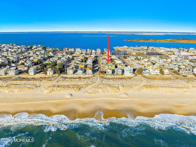 25 E 49th St, Long Beach Twp, NJ 08008 - aerial view of residential area with a nearby body of water