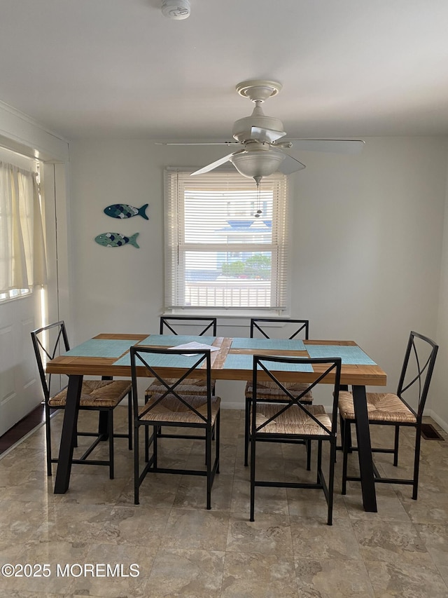 25 E 49th St, Long Beach Twp, NJ 08008 - dining space with a ceiling fan