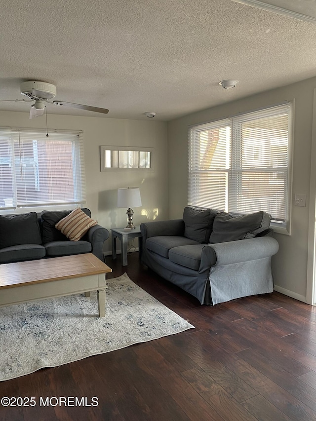 25 E 49th St, Long Beach Twp, NJ 08008 - living room with wood finished floors, a textured ceiling, and ceiling fan