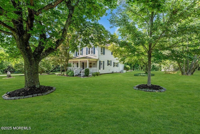 660 Herbertsville Rd, Brick, NJ 08724 - view of green lawn featuring covered porch