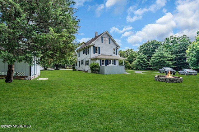 660 Herbertsville Rd, Brick, NJ 08724 - back of property featuring a yard and a chimney