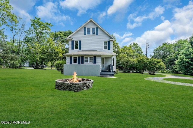 660 Herbertsville Rd, Brick, NJ 08724 - back of property featuring an outdoor fire pit and a yard