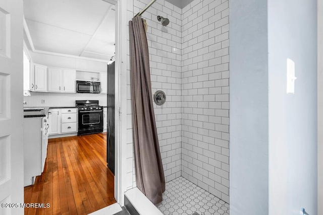 660 Herbertsville Rd, Brick, NJ 08724 - full bath featuring a shower stall and wood-type flooring