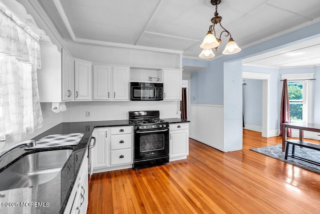 660 Herbertsville Rd, Brick, NJ 08724 - kitchen with black appliances, dark countertops, white cabinets, and light wood finished floors