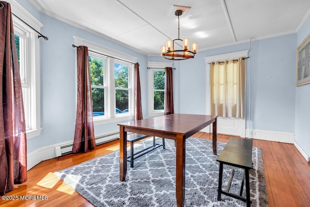 660 Herbertsville Rd, Brick, NJ 08724 - dining space featuring a chandelier, wood finished floors, and crown molding
