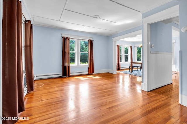 660 Herbertsville Rd, Brick, NJ 08724 - spare room featuring light wood-style flooring, ornamental molding, and baseboard heating