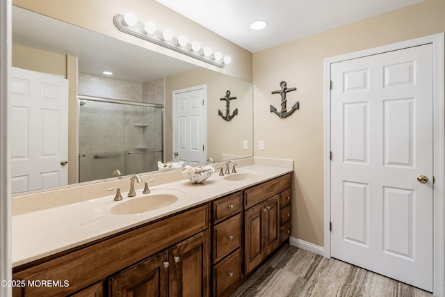 507 Amber St Unit B, Beach Haven, NJ 08008 - full bath featuring double vanity, a stall shower, and wood finished floors