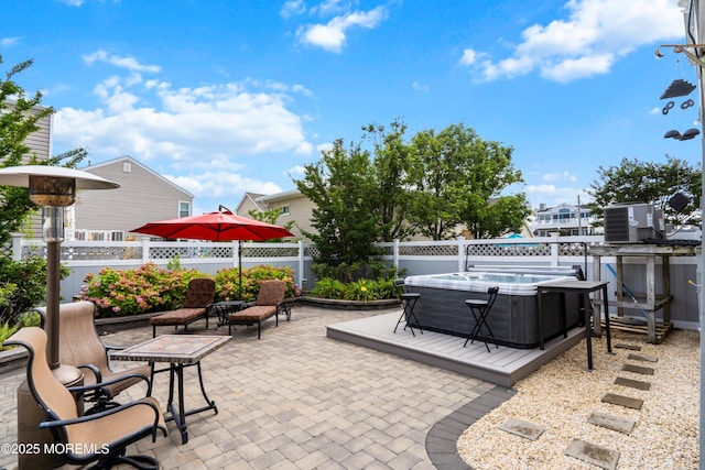 507 Amber St Unit B, Beach Haven, NJ 08008 - view of patio with a hot tub and a deck