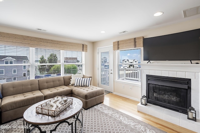 507 Amber St Unit B, Beach Haven, NJ 08008 - living area with wood finished floors, recessed lighting, and a tile fireplace