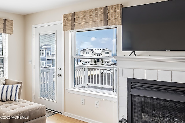 507 Amber St Unit B, Beach Haven, NJ 08008 - living area with wood finished floors and a tiled fireplace