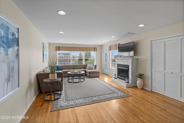 507 Amber St Unit B, Beach Haven, NJ 08008 - living area featuring wood finished floors, a tile fireplace, and recessed lighting