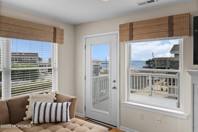 507 Amber St Unit B, Beach Haven, NJ 08008 - doorway to outside with baseboards and wood finished floors