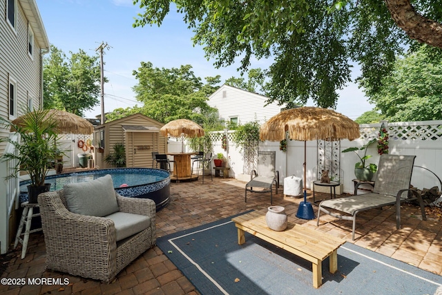 529 Smith Dr, Point Pleasant, NJ 08742 - fenced backyard with a storage unit and a patio area