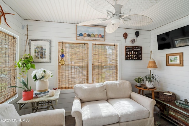 529 Smith Dr, Point Pleasant, NJ 08742 - living room with wood walls, a ceiling fan, and wood finished floors
