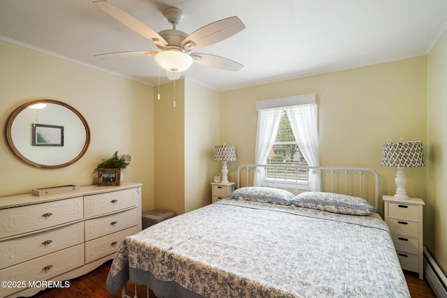 529 Smith Dr, Point Pleasant, NJ 08742 - bedroom with baseboard heating, dark wood-type flooring, ornamental molding, and ceiling fan