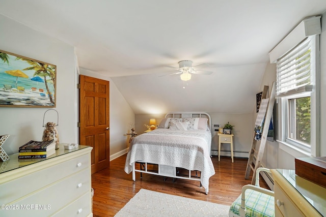 529 Smith Dr, Point Pleasant, NJ 08742 - bedroom with light wood-style flooring, a baseboard heating unit, lofted ceiling, and ceiling fan