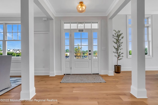 116 Eagle Way, Eatontown, NJ 07724 - entrance foyer featuring crown molding, light wood-style flooring, and healthy amount of natural light