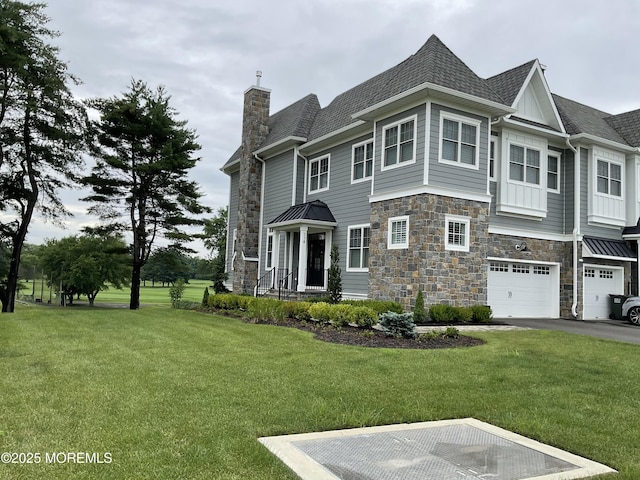 116 Eagle Way, Eatontown, NJ 07724 - view of front of home with stone siding, a chimney, a front yard, a garage, and asphalt driveway