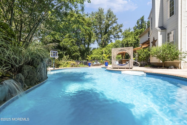 6 Tower Ct, Farmingdale, NJ 07727 - swimming pool with a pergola, view of scattered trees, and a patio