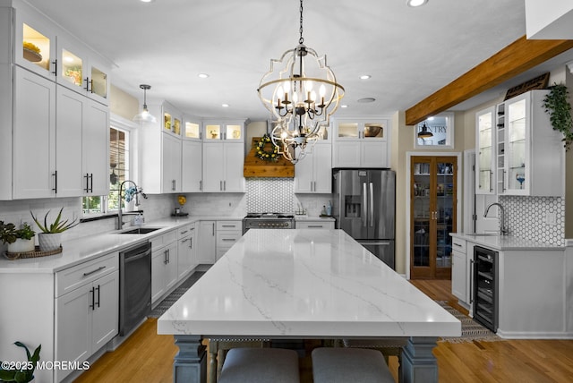 6 Tower Ct, Farmingdale, NJ 07727 - kitchen with stainless steel fridge, dishwasher, beverage cooler, decorative backsplash, and a chandelier