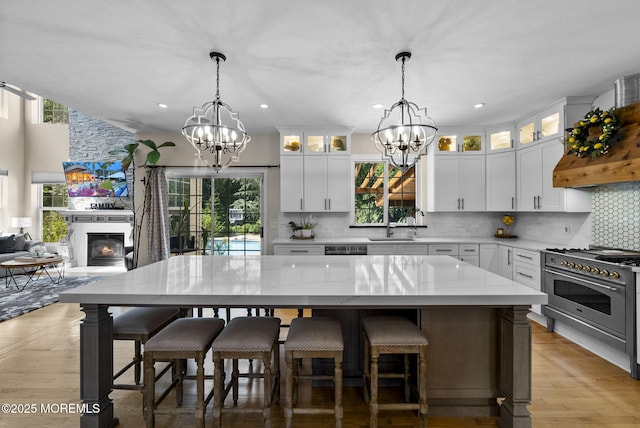 6 Tower Ct, Farmingdale, NJ 07727 - kitchen with a chandelier, stainless steel appliances, plenty of natural light, and recessed lighting