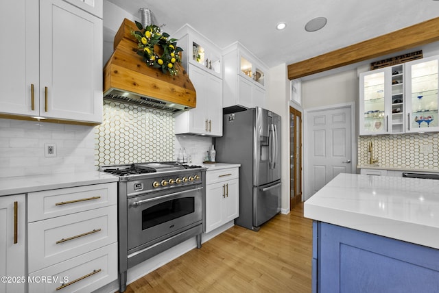 6 Tower Ct, Farmingdale, NJ 07727 - kitchen featuring stainless steel appliances, tasteful backsplash, white cabinetry, light wood-type flooring, and recessed lighting