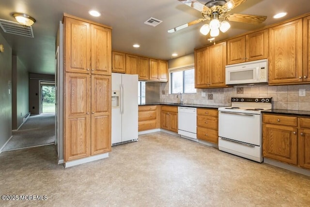239 Medford Ct Unit B, Manalapan, NJ 07726 - kitchen with white appliances, tasteful backsplash, dark countertops, recessed lighting, and a ceiling fan