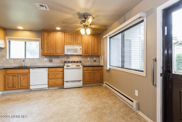 239 Medford Ct Unit B, Manalapan, NJ 07726 - kitchen featuring white appliances, a baseboard heating unit, brown cabinetry, ceiling fan, and backsplash