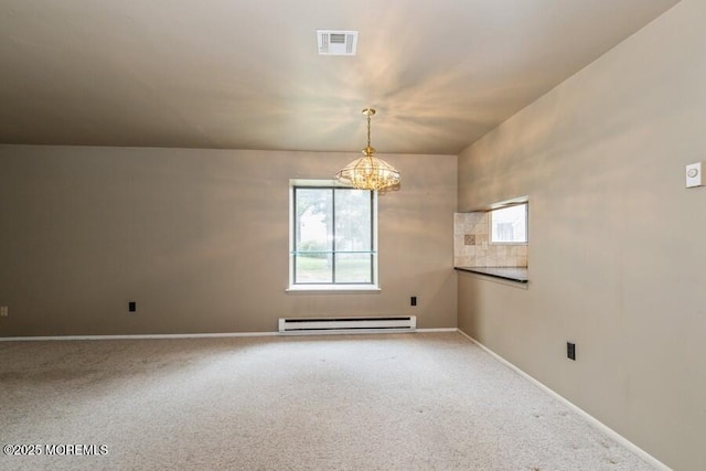 239 Medford Ct Unit B, Manalapan, NJ 07726 - unfurnished room with a baseboard radiator, a chandelier, and carpet floors