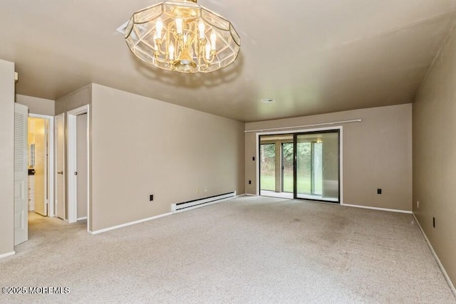 239 Medford Ct Unit B, Manalapan, NJ 07726 - unfurnished room with baseboard heating, carpet floors, and a chandelier