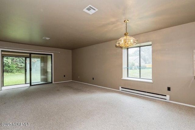 239 Medford Ct Unit B, Manalapan, NJ 07726 - carpeted empty room with a baseboard radiator and a chandelier