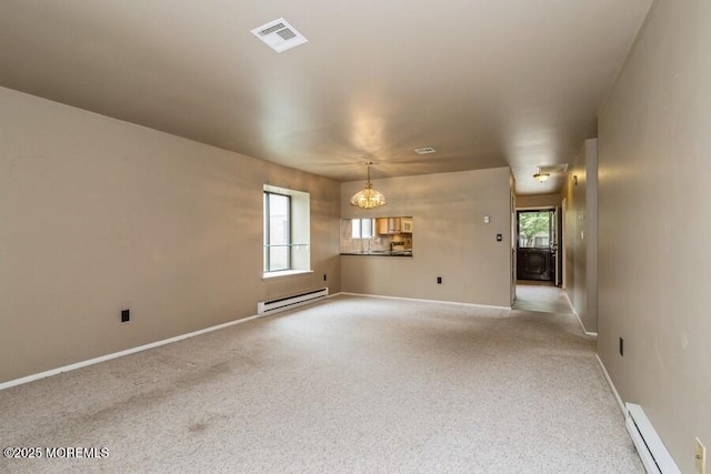 239 Medford Ct Unit B, Manalapan, NJ 07726 - unfurnished room with a baseboard heating unit, a baseboard radiator, light carpet, and a chandelier