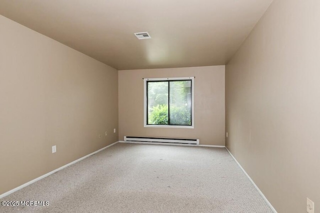 239 Medford Ct Unit B, Manalapan, NJ 07726 - empty room featuring a baseboard heating unit and carpet floors