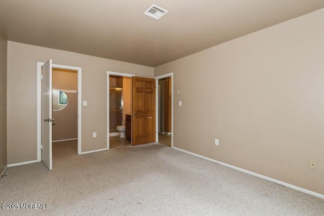 239 Medford Ct Unit B, Manalapan, NJ 07726 - unfurnished bedroom with a spacious closet, carpet flooring, and connected bathroom