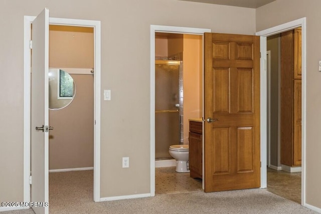 239 Medford Ct Unit B, Manalapan, NJ 07726 - unfurnished bedroom featuring carpet, a walk in closet, and connected bathroom